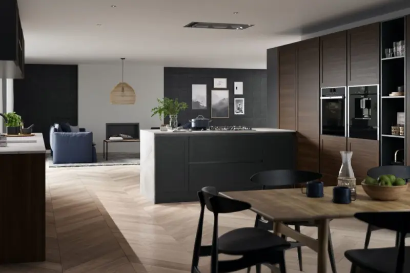 A Caledonia Deveron Handle-less kitchen in Fired Charcoal with light walnut
